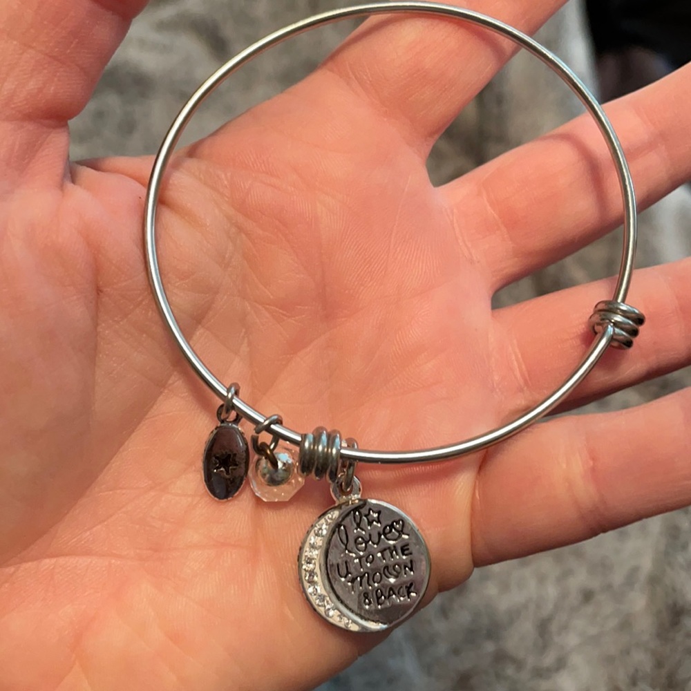 Dangle bracelet with charm